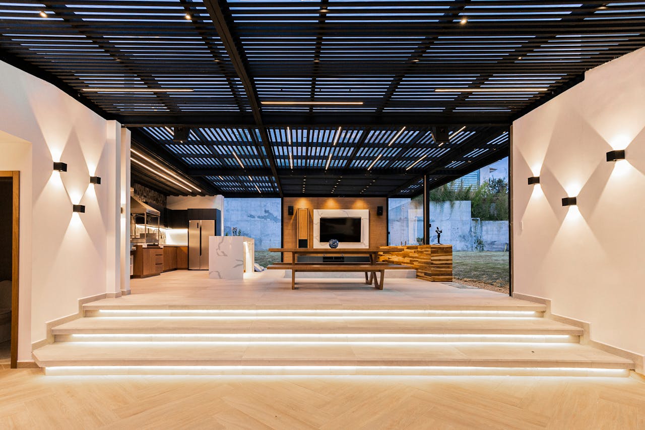 Contemporary open-plan living area with sleek design and minimalism.